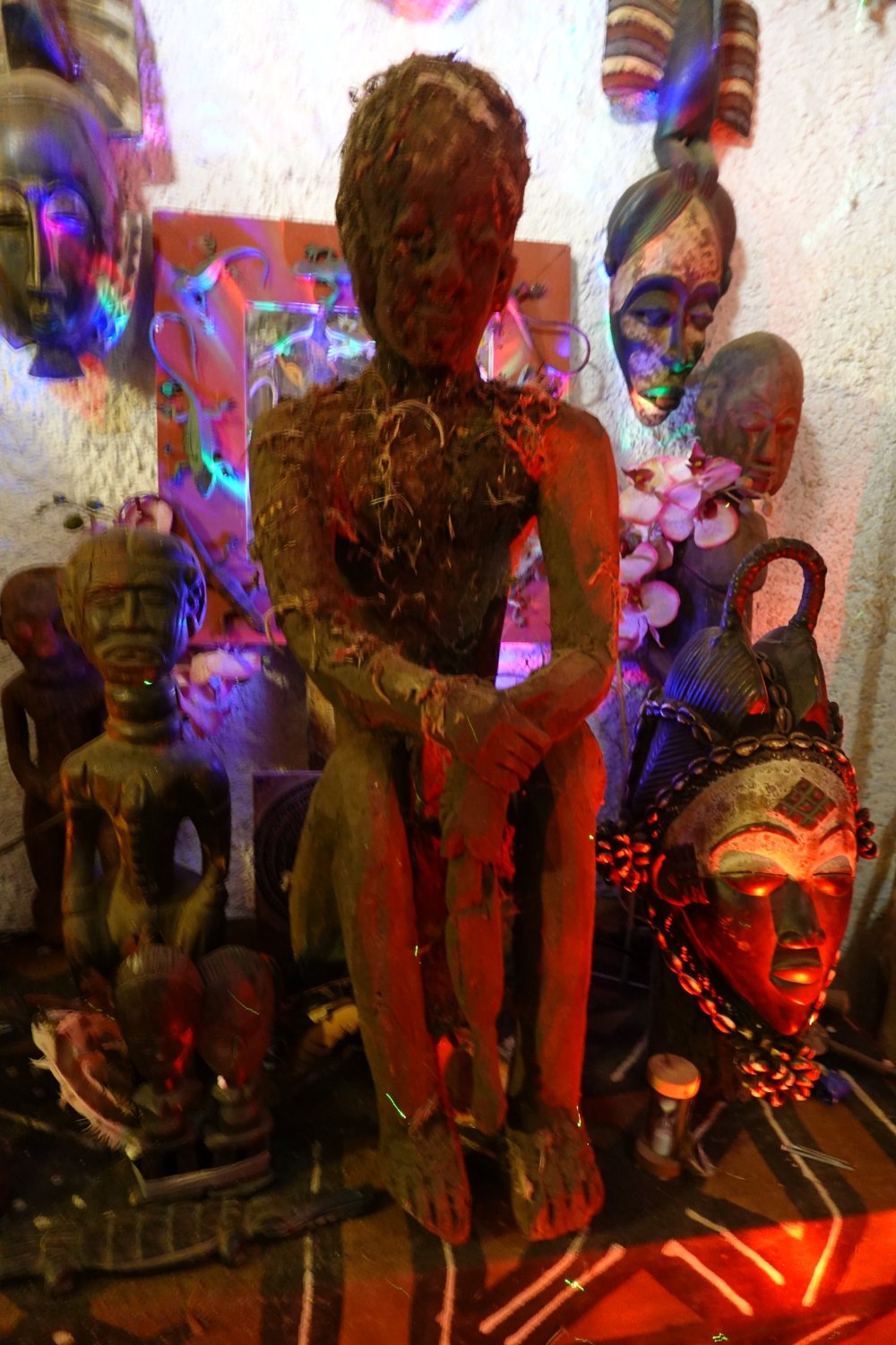 African ritual objects illuminated in the theatre